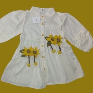 White Dress with Yellow Floral Accents Can Be Worn As Shirt